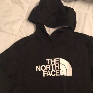 Black north face hoodie with white writing. Excellent condition